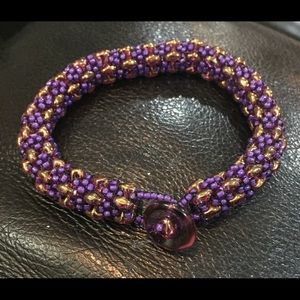 Hand made Beaded woven purple and gold bracelet